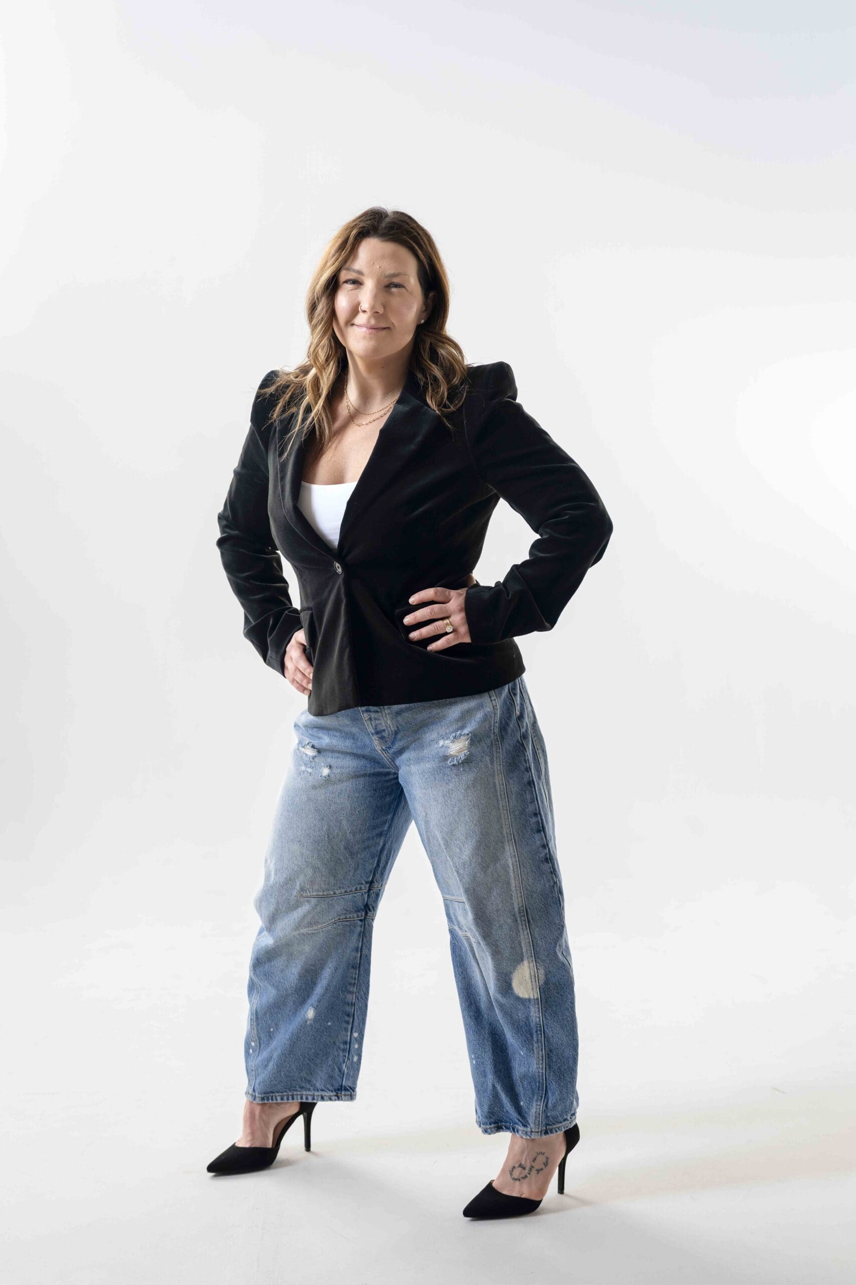 Boise branding photographer capturing a confident functional medicine business coach for Empowered Practice Collective during a studio branding session