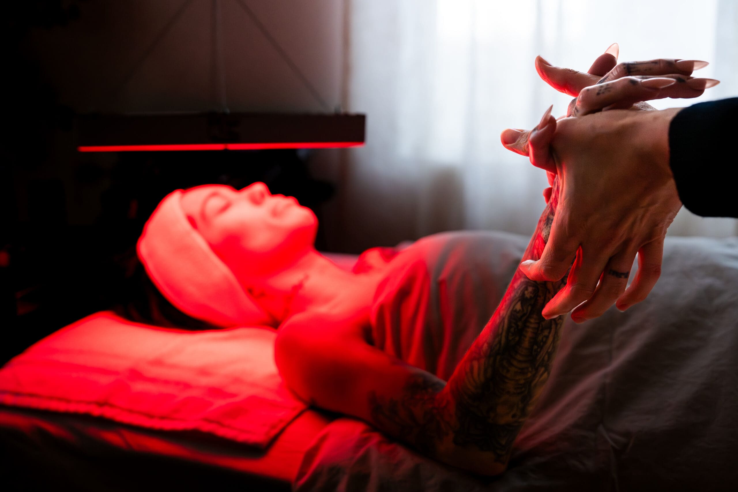 client receives red light therapy treatment and massage during boise branding photoshoot