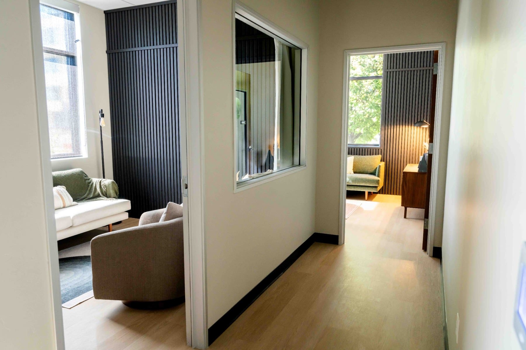 Hallway connecting the practice’s seating and treatment spaces